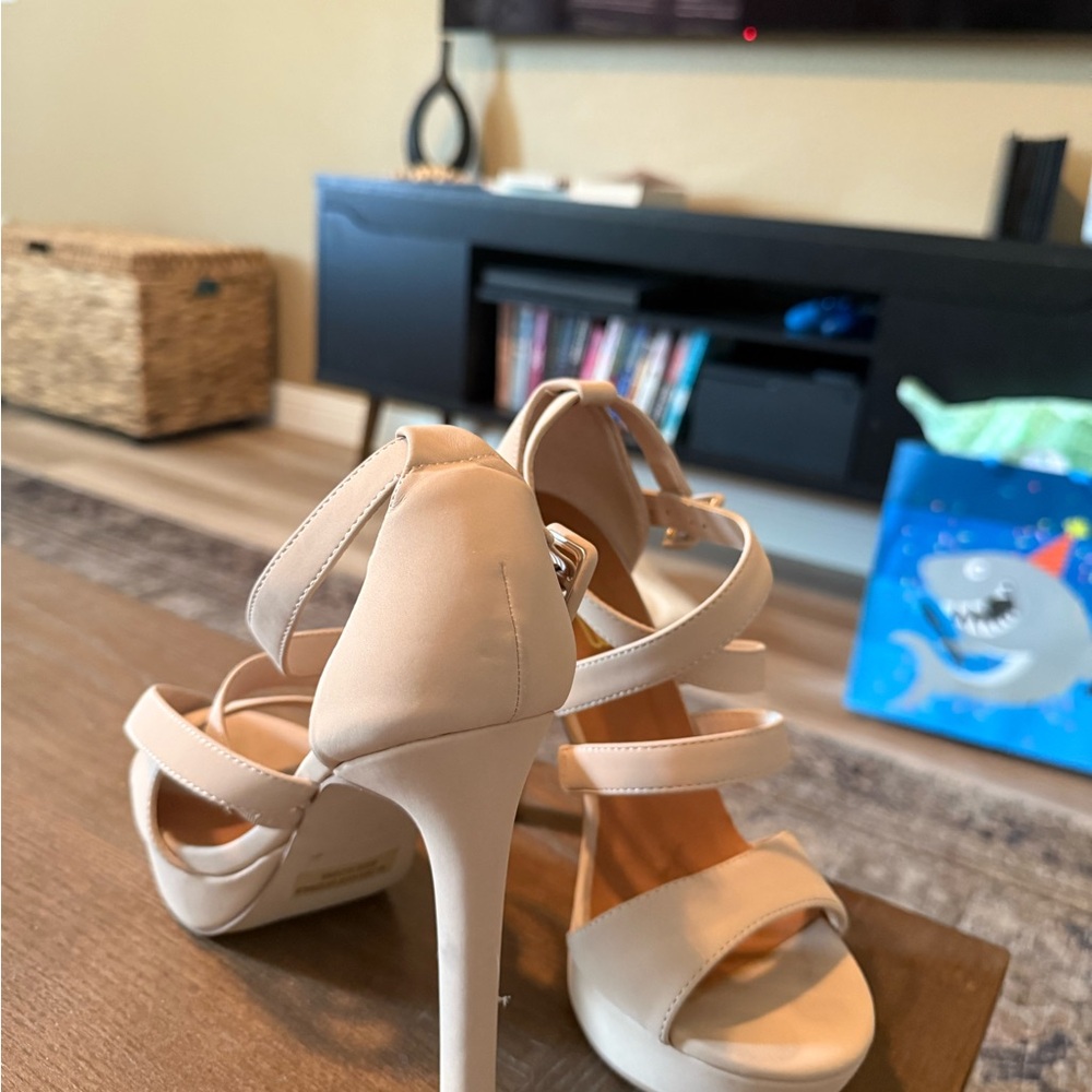 Nude strappy heels